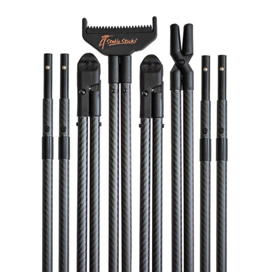 Apoyo de tiro 4StableSticks Ultimate Carbon desmontado en fibra de carbono sobre fondo claro
