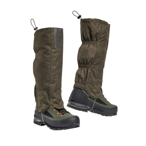 Polainas Beretta Tech Ankle colocadas sobre botas de montaña en Carril Outdoor